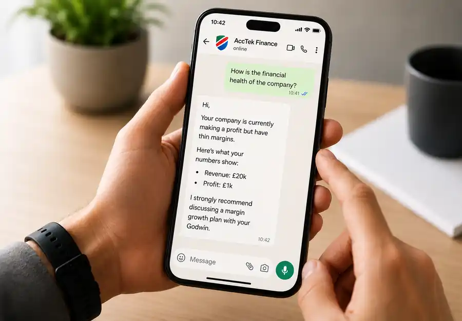AccTek Finance answering a cash flow question over WhatsApp, showing May cash inflows, outflows and net cash flow